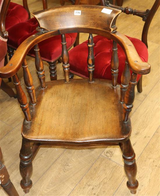 A Victorian elm and beech smokers bow chair